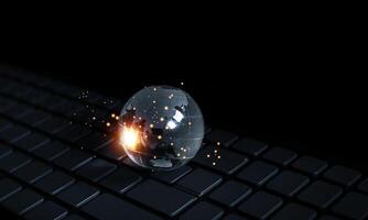 a computer keyboard with a glowing object on it photo