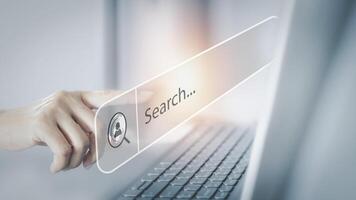 search button on laptop screen photo