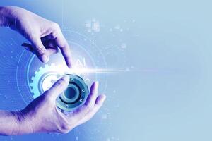 hands holding a blue button on a blue background photo