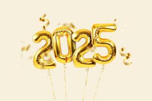 Golden balloons 2025 with golden ribbon with confetti flying on beige background, concept. New Year, creative idea card photo