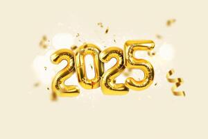 Golden festive balloons 2025 with confetti, sparkles and bokeh on beige background. Happy new year card, creative photo
