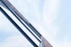 Sky with white clouds reflected in modern building windows. Background image. photo