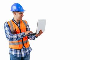 copyspace Engineer in reflective vest and hard hat analyzing project data on laptop white background photo