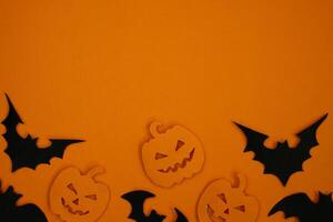 Bat and pumpkin ornament for copy space background photo