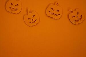 Pumpkin paper cut out for copy space background photo