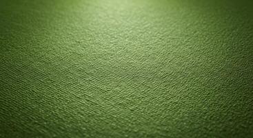 Green textured surface background with detailed weave pattern design photo