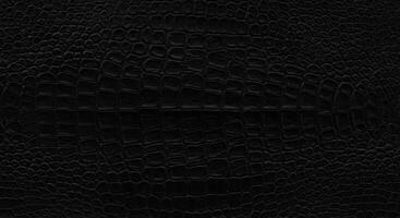 Black crocodile skin texture background for fashion and luxury designs photo