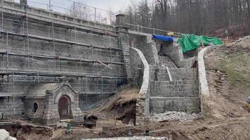 The renovation of the historic stone structure enhances its beauty, function, and history photo