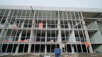 The facade of the building during the renovation. 5 video