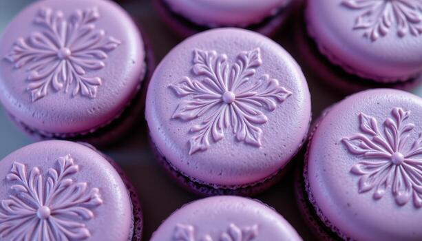 close up view of violet hued macarons with delicate floral patterns etched on the top. photo