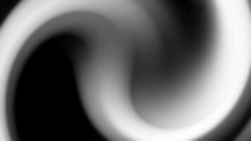 Dynamic black and white flowing shapes creating a seamless gradient effect suitable for background video
