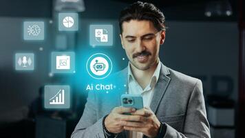 Professional man using smartphone for AI chat in modern office setting with technology icons photo