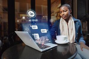 Young woman engages in virtual conversation at a cafe, using laptop in a modern workspace during the day photo