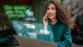 Woman engaged in conversation while using laptop in urban setting showcasing modern technology and communication tools photo