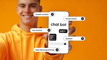 Young man showcasing a chatbot interface on a smartphone against a bright orange background photo