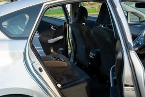 Backseat of a silver car view photo