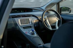 Inside of a car showing dashboard photo