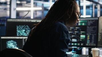 Irritated data center engineer punching desk, irked by glitches while using algorithms to analyze datasets. Mad server hub developer raging, annoyed by malfunctioning AI neural networks, camera B video