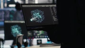 Server hub technician arriving in office, using AI visualization insights on PC to optimize system health. Data center IT specialist using computer node tree software to analyze gear issues, camera B video