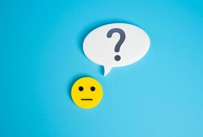 A neutral, emotionless face asks a question. Surveys and statistics collection. Opinion and feedback. Public opinion polls, or demographic research. Analytics, behavior study, marketing feedback photo