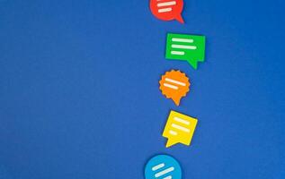 Various reviews and opinions in the form of colorful conversational figures. Diversity of feedback, user engagement. Customer reviews, open forums. photo