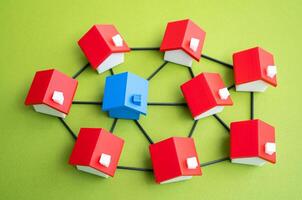 Blue House in a network of connected houses. Autonomy and self-sufficiency. Smart home technologies on a community scale. Data sharing, energy efficiency. IoT adoption. Sustainable communities, photo