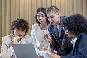 Caucasian woman sale manager is showing annual report chart to the colleagues in executive meeting for next year plan with market share increase for global business and investment photo