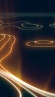 Glowing abstract fluid lines in a dark space, forming flowing energy paths in golden and white hues video