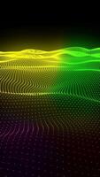 Colorful wave grid of neon dots forming a glowing terrain on dark background video