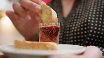 A Womans Hand Dips Biscuits Into Typical Indian Tea video
