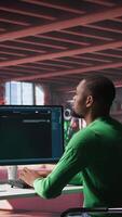 Vertical Remote worker uses conversational AI bot to help solve daily tasks, chatting with machine learning powered chatbot to generate data responses. Efficiency with AI assistant tool. Camera B. video