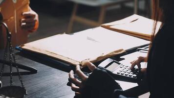 A person is using a calculator to calculate the amount of money owed video
