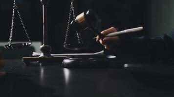 A person holding a cigarette and a scale of justice video