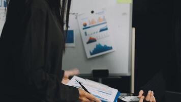 Two business people are talking about something on a whiteboard video