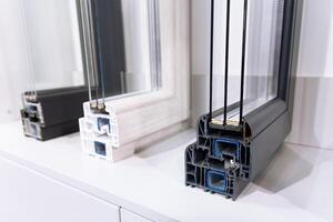 Samples of the profile of modern PVC windows on the showcase photo