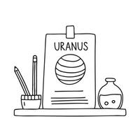A flashcard marked Uranus lying on a school desk vector