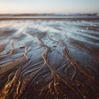 Patterned Sand On A Calm Beach That Looks Like Art photo