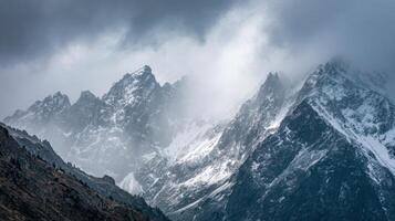 Rough And Rocky Summits Rising Above The Cloud Layer photo
