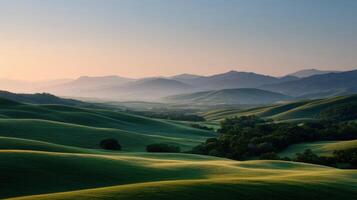 Sunrise Over A Green And Rolling Hillside photo