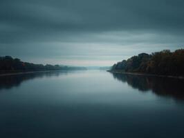 The Contemplative And Calm Mood Of A River Under Clouds photo