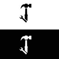 A hammer and wrench are shown in black and white vector