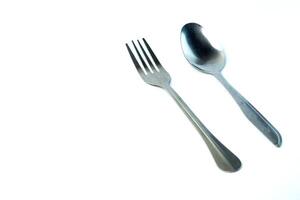 Classic stainless steel spoon and fork set, perfect for dining and everyday use. Durable, reusable, and easy to clean, ideal for home, restaurants, and kitchen essentials. photo