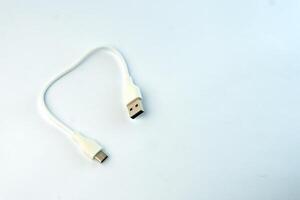 White USB to Micro USB cable for fast charging and data transfer. Compact and durable, ideal for smartphones, tablets, power banks, and other electronic devices photo