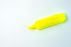 A yellow highlighter pen with a chisel tip for smooth, precise marking. Perfect for students, office work, and note-taking. Fast-drying, smudge-proof, and long-lasting ink. photo