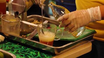 Sequential preparation of a refreshing honey lemon soda. video