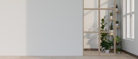 Empty white wall of a room with indoor potted plants at the end of wooden floor corridor or hallway. photo