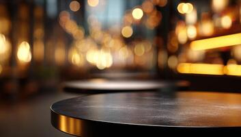 Dark, shallow depth of field image showing two round tables in a dimly lit space with blurred warm lights in the background photo