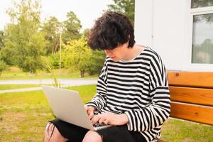 Remote work setup in green natural environment photo