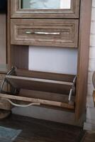 Shoe locker with unloading shelf open photo