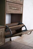Shoe locker, with unloading shelf open photo